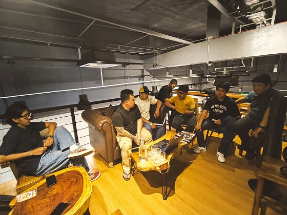 RBL members having an indoor Tambike meeting