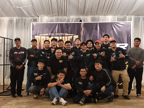 RBL members posing together at a motorcycle event