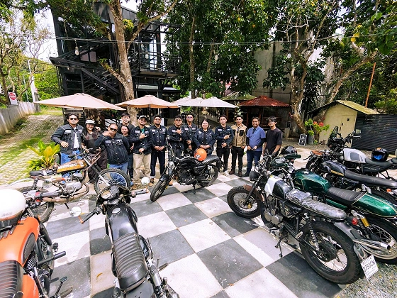 RBL members posing with their motorcycles at a Tambike meetup